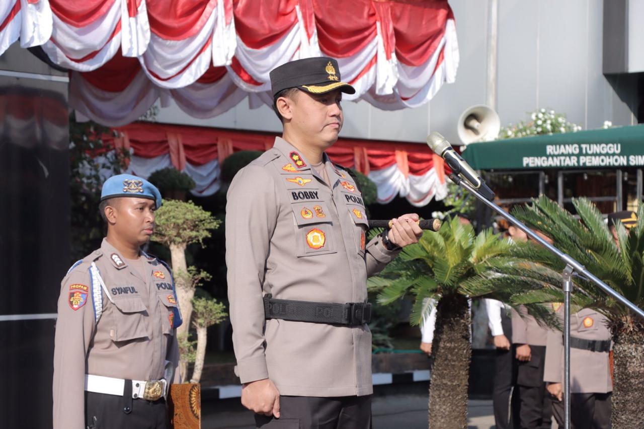 Kapolres Lamongan Pimpin Upacara Pengukuhan Struktur Organisasi dan Susunan Pengurus Komite Olahraga Polri (KOP) di Polres Lamongan